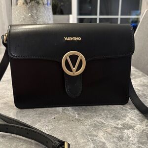Valentino Elegant Black Crossbody with Gold Accents